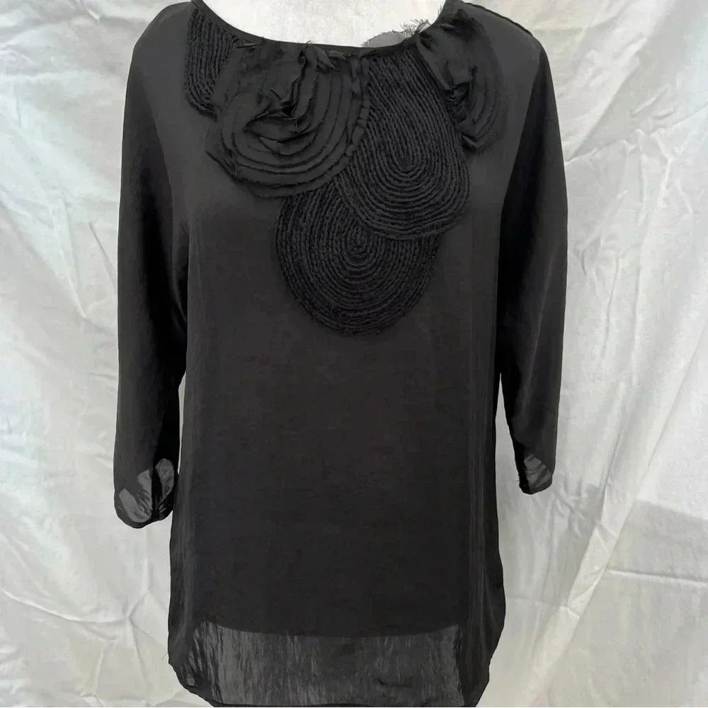 Michael Kors black 3/4 sleeve blouse with floral detail.